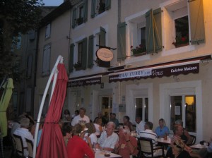 Le Rendez-Vous one busy evening in mid-summer.  There's an evening market in town too.