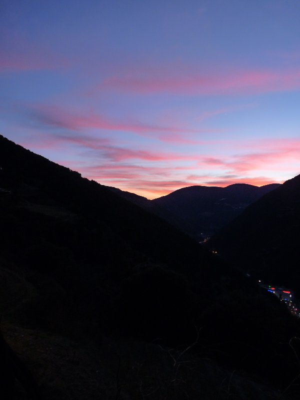 Sunset seen from our window.  And yes, far below you can just see that so-near-yet-so-far supermarket.