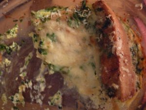 Ooops!  I almost left it too late to take a snap of a crunchy crust of baguette nestling in its  cheesy, eggy blanket.