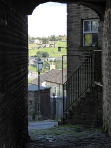 Peeking through a doorway in Haworth.