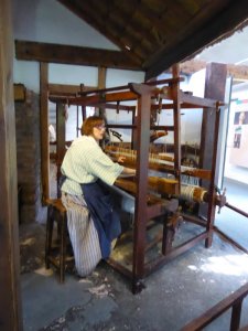 Here's pre-industrial weaving. These looms were a big investment for a family, but offered year-round employment.