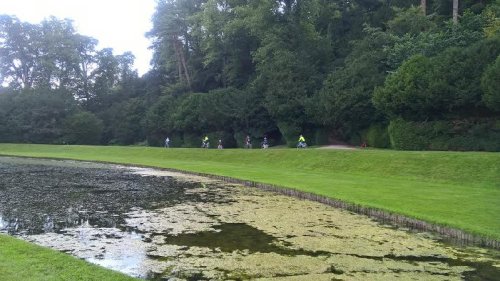 One of the last families of the evening finishes the last lap.