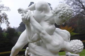 Wrestling gladiators newly painted white.