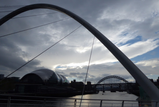 The Millennium Bridge, looking along the Tyne towards the Sage concert hall and the Tyne Bridge.
