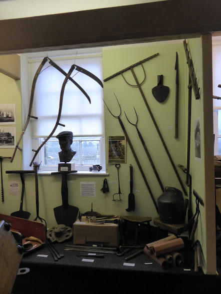 Tools both heavy and huge in use on the farm.